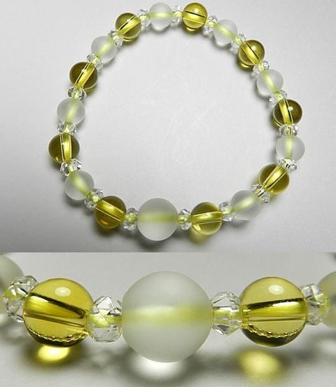 Crystal windowed light snow design bracelet with yellow crystal combination