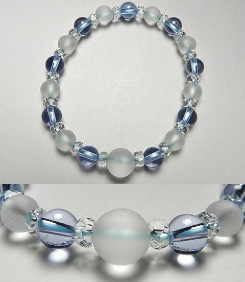 Crystal windowed light snow design bracelet with blue quartz combination