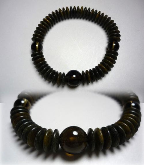 Green sandalwood bracelet with brown crystal