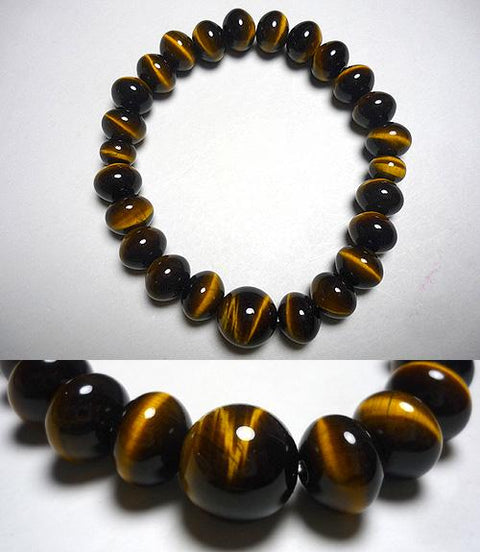Tiger's eye stone and orange bead bracelet