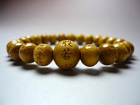 Boxwood round bead bracelet with the Heart Sutra