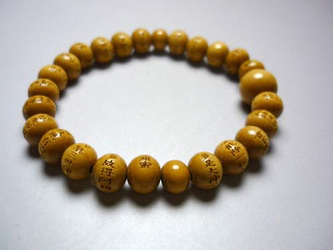 Boxwood round bead bracelet with the Heart Sutra