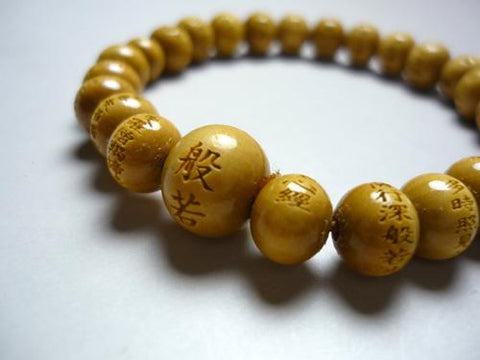 Boxwood round bead bracelet with the Heart Sutra