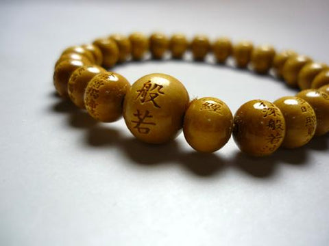 Boxwood round bead bracelet with the Heart Sutra