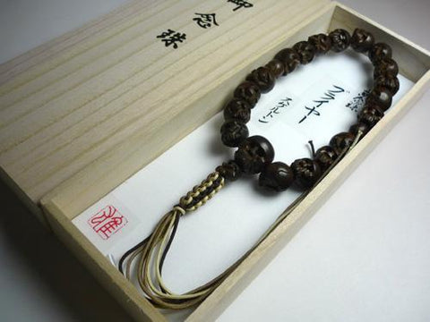 Men's prayer beads, briar wood, skull carving