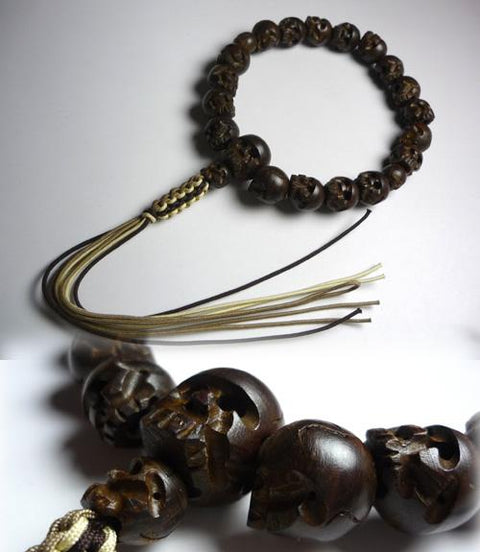 Men's prayer beads, briar wood, skull carving