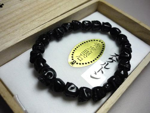 Blue Tiger's Eye skull-carved bracelet