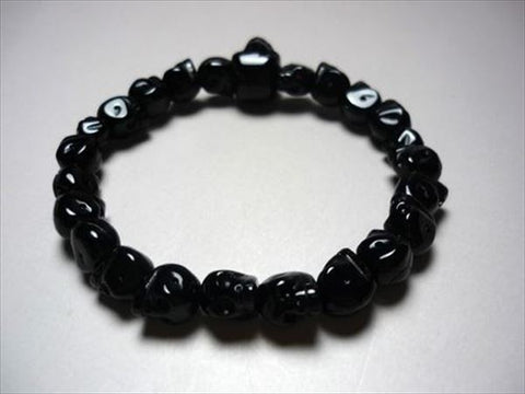 Black Onyx Skull-Carved Skeleton Bracelet 6430290000000 - worn on wrist