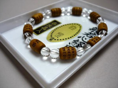 Heart Sutra carving, sandalwood, bale-shaped crystal bracelet