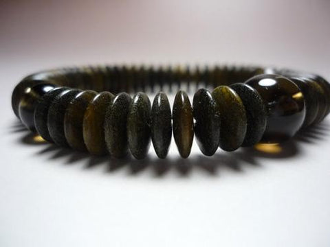Green sandalwood bracelet with brown crystal