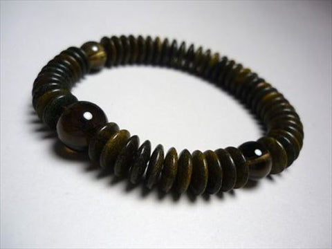 Green sandalwood bracelet with brown crystal