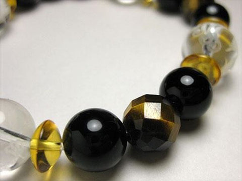 Feng shui four guardian beasts carved tiger's eye bracelet