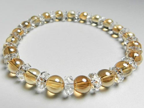 Gold aura 6mm bead bracelet with cut crystal