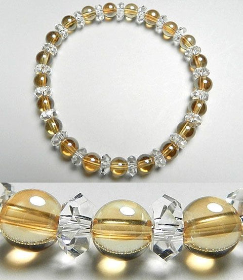 Gold aura 6mm bead bracelet with cut crystal