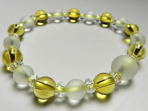 Crystal windowed light snow design bracelet with citrine combination