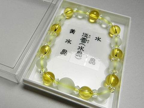 Crystal windowed light snow design bracelet with citrine combination