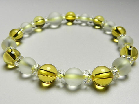 Crystal windowed light snow design bracelet with citrine combination