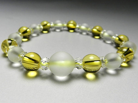 Crystal windowed light snow design bracelet with citrine combination