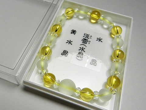 Crystal windowed light snow design bracelet with citrine combination