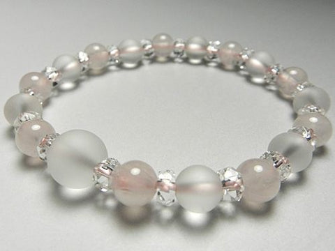Crystal windowed light snow design bracelet with rose quartz combination