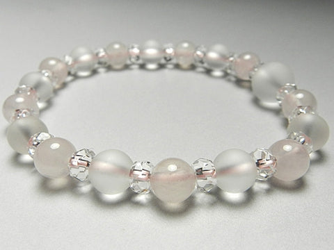 Crystal windowed light snow design bracelet with rose quartz combination