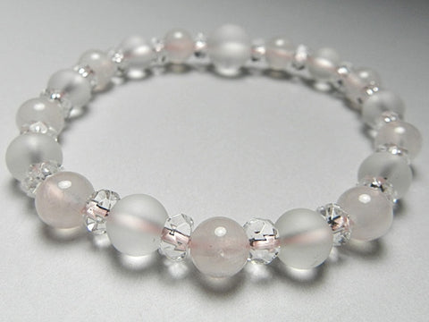 Crystal windowed light snow design bracelet with rose quartz combination