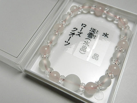 Crystal windowed light snow design bracelet with rose quartz combination