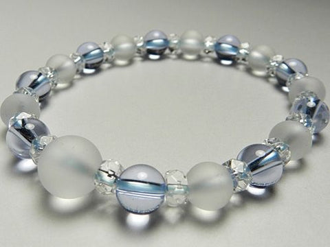 Crystal windowed light snow design bracelet with blue quartz combination