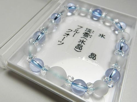 Crystal windowed light snow design bracelet with blue quartz combination