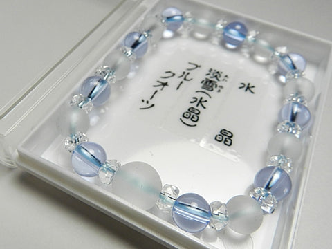 Crystal windowed light snow design bracelet with blue quartz combination
