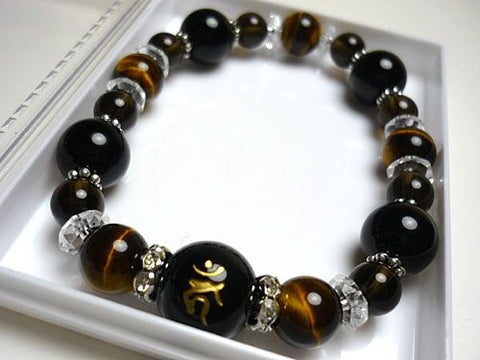 Black Onyx Large-Bead Bracelet Acala Carving 6865410000000 - worn on wrist