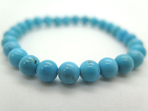 Arizona Turquoise 7mm Bead Bracelet Straight 7106787000000 - worn on wrist