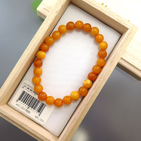 Aged Amber 8mm Bead Bracelet Straight 9903400000000 - worn on wrist