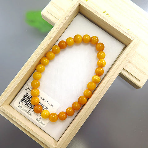 Aged Amber 8mm Bead Bracelet Straight 9903500000000 - worn on wrist